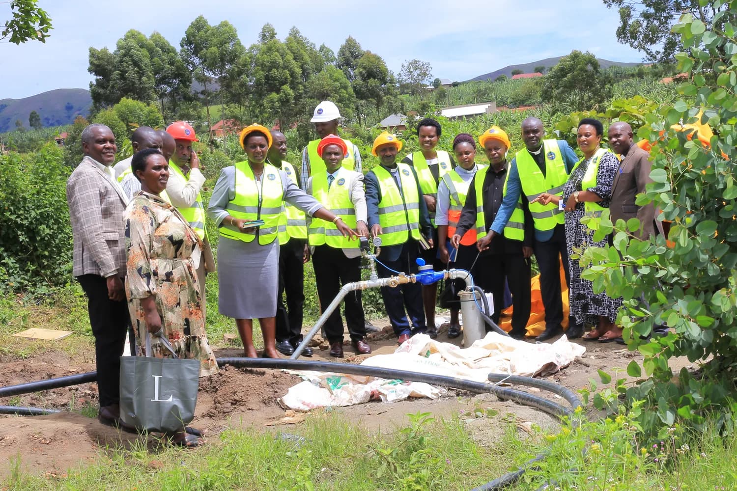 Group photograph at the Rubaare Secondary School water project site.